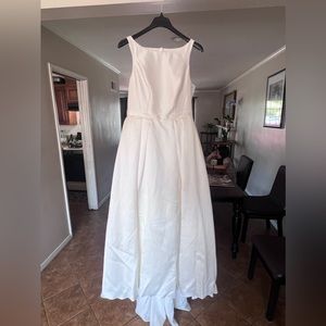 Mikado ballgown with pleated skirt size 14 in the color ivory